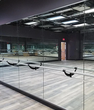 Custom Mirror Wall Installation